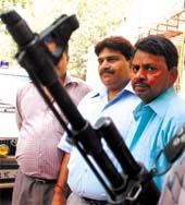 Imposter B.K.Verma, who tried to extort a deal with SP leader Amar Singh, being paraded by Delhi Police before media persons in the Capital on Tuesday.
