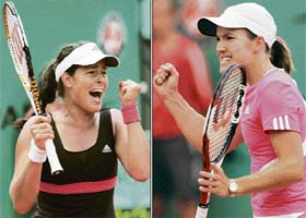 Serbias Ana Ivanovic (left) and Belgiums Justine Henin celebrate after winning their quarterfinal matches at the French Open in Paris