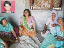 Inconsolable members of the family of Salim  (inset) who was brutally stabbed to death at a village near Baddi 