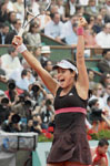 Serbias Ana Ivanovic rejoices after defeating Russias Maria Sharapova.