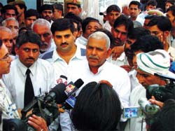 Aant Ram Tawar of the INLD and his party colleagues leave court premises after being granted bail in Gurgaon on Friday.