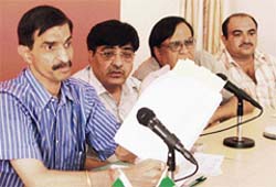 State BJP secretary Anil Sarin and district president Subash Verma address mediapersons in Ludhiana