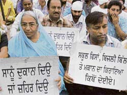 Victims of Janta market fire, who have been camping at the fire site for the past 10 days, in Mohali on Sunday