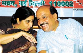BJP senior leader Sushma Swaraj with the partys Delhi unit president Harsh Vardhan at a seminar on sacrilegious paintings organised by the Delhi BJP at Hindi Bhavan in the Capital