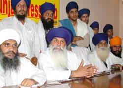 Damdami Taksal chief Baba Ram Singh addresses a press conference in 