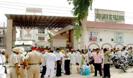 A dharna in front of Greenland Public School in Ludhiana