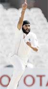 Englands Monty Panesar celebrates on taking the wicket of West Indies Denesh Ramdin during the fifth day of the third Test at Old Trafford, Manchester