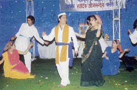 Members of the Uttarakhand community perform a Kumaoni dance during one of their cultural celebrations in Chandigarh