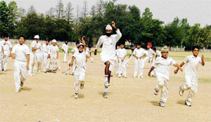 Trainees take part in a conditioning camp being organised on the PAU campus ground, Ludhiana, on Tuesday.