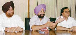Verka milk plant officials at a press conference in Ludhiana on Wednesday.