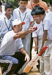 Punters tips: Australian captain Ricky Ponting interacts with aspiring cricketers during a promotional tour Innings with Ponting in Bangalore on Wednesday. 