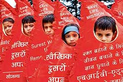 Children participate in an awareness rally organised by the Save Life Mission in collaboration with the HP State AIDS Control Society