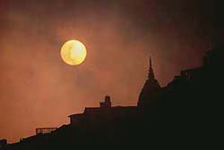 A view of the sunset in Shimla on a cloudy Friday