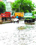 Scenes after showers at Industrial area in Sector 37 in Gurgaon.