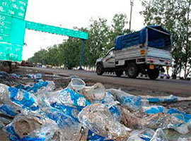 Disposable plastic glasses are seen dumped near the toll plaza barrier after a chhabeel in Karnal on Saturday.