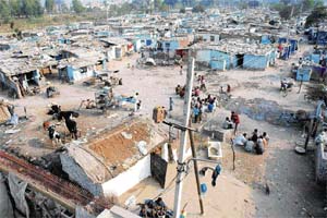 About 55 per cent of the urban population lives in slumsareas largely devoid of proper sanitation and other basic civic amenities