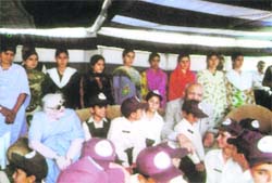Jammu & Kashmir Governor Lieut-Gen S.K. Sinha (retd) and his wife with women and children of Reasi at Shakti Sadan