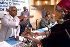 Chief Justice of India K G Balakrishnan inaugurates the legal awareness campaign 2007-08 at Sher-e-Kashmir International Convention in Srinagar on Monday. Jammu and Kashmir Governor S. K. Sinha and Chief Minister Ghulam Nabi Azad are also seen in picture.