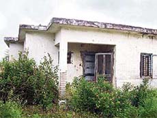The building housing the agriculture extension office, Lakhwal village, wears a deserted look