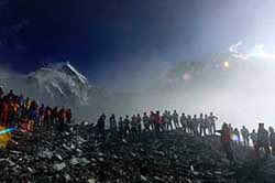 Participants in the Everest Marathon line up for the start off from Everest base camp, Nepal, in this May 19, 2003 file photo. China plans to build a highway on the side of Mount Everest to pave the way for the Olympic torch's journey to the peak of the world's tallest mountain. 