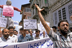 Activists of the Peoples Freedom League protest against the knighting of Salman Rushdie  in Srinagar 