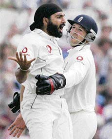 Panesar celebrates with wicketkeeper Matt Prior after the fall of a West Indian wicket during the Old Trafford Test