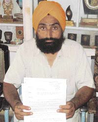 Amritpal Singh shows orders of the court and other documents in Ahmedgarh
