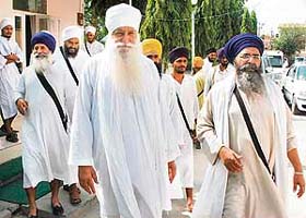 Leaders of various Sikh organisations come out of the office of the DIG after holding a meeting with him over the Khalsa march in Bathinda