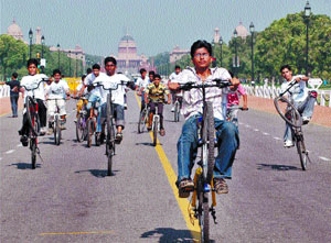 Children participating in a cycle rally to spread awareness of environment at Rajpath in the Capital on Sunday.
