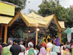 Kashmiri Pandits pay obeisance to Goddess Sharika at Aganjar Mahadev temple at Khaniara(Kangra)on the occasion of Jaishtha Ashtami on Sunday.
