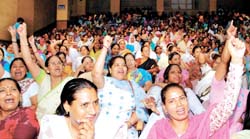 Delhi Pradesh Mahila Congress activists shout slogans in favour of UPA presidential nominee Pratibha Patil during the one-day convention, organised by Delhi Pradesh Mahila Congress, in the Capital