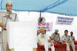 R.K. Jaiswal, SSP, addresses a meeting of transporters on International Drug Deaddiction Day in Ludhiana
