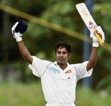 Sri Lankas Chaminda Vaas celebrates on reaching his century during the second day of the first Test against Bangladesh in Colombo on Tuesday.  Reuters