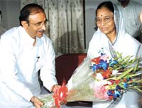DPCC president Rambabu Sharma greets UPA's presidential candidate Pratibha Patil during a meeting in the Capital on Wednesday.