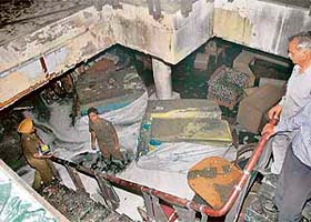 Firemen at the Sector 26 showroom where a fire broke out in Chandigarh