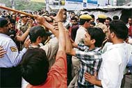 Taxi drivers clash with policemen near the lift in Shimla