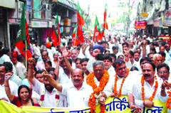 Delhi BJP president Harsh Vardhan with his party councillors leads a protest march from Town Hall to Nirman Bhavan against the hike in conversion charges and parking fee in the Capital on Friday.
