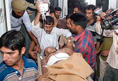 Jammu and Kashmir police constable Rakesh Kumar being shifted to the Medical College Hospital in Jammu on Saturday.