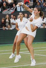 Sania Mirza (left) and Israels Shahar Peer in action during their first-round match against Swedens Sofia Arvidsson and Lilia Osterloh of the USA at Wimbledon in London on Friday.