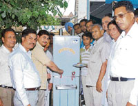 Manish Kumar, SDM, inaugrates a water cooler in Amloh.