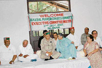 State president of the Congress Viplove Thakur interacts with Chief Minister Virbhadra Singh during the executive meeting of the Himachal Pradesh Congress Committee at Palampur on Monday.