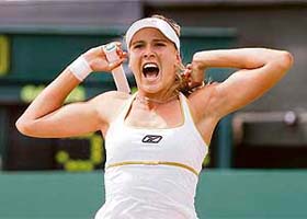Nicole Vaidisova of the Czech Republic reacts after beating France's Amelie Mauresmo in the fourth round at Wimbledon