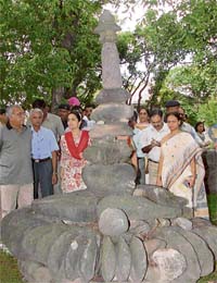 Haryana Chief Minister Bhupinder Singh Hooda and minister of state for tourism Kiran Chaudhary (extreme left) at the remnants of the Bhima Devi Temple in Pinjore