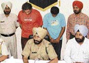 The two alleged rapists in police custody in Ludhiana.