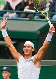 Spains Rafael Nadal celebrates after defeating Swedens Robin Soderling during the third round at Wimbledon on Wednesday.