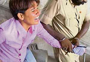 Baljit Kaur, one of the two girls who went for a same-sex marriage, being taken to the hospital after she slit her veins at the Batala police station