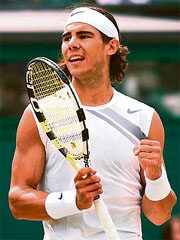 Spains Rafael Nadal rejoices after beating Tomas Berdych of the Czech Republic in the quarterfinal at Wimbledon on Friday.
