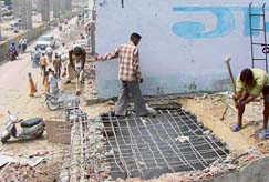 A demolition drive by the National Highway Authority of India (NHAI) and the administration in progress along the national highway at Zirakpur