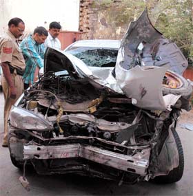 The mangled remains of an over-speeding Toyota car, allegedly driven by an inebriated girl, hit bullock carts, in the wee hours of Saturday at Connaught Place in the Capital