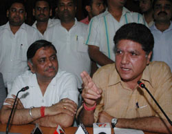 Punjab BJP chief Rajinder Bhandari (R) along with local bodies minister Manoranjan Kalia addresses a press meet in Jalandhar on Saturday.